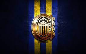 Logo of argentine club atlético rosario central, sited in the santa fe province. Herunterladen Hintergrundbild Rosario Central Fc Goldenen Logo In Der Argentinischen Primera Division Blau Metall Hintergrund Fussball Ca Rosario Central Argentinischen Fussball Club Rosario Central Logo Fussball Argentinien Club Atletico