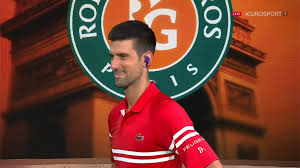 Novak djokovic celebrates his victory at the french open. French Open Tennis Novak Djokovic Jokes About Serve Superstitions Why Are You Revealing My Secrets Eurosport