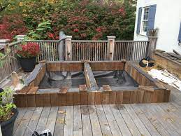 After a long, stressful day, a hot tub spa incorporated into the deck in your backyard is simply the perfect must have luxury for relaxing soaks. Hot Tub To Garden Conversion Green Gate Woodworks