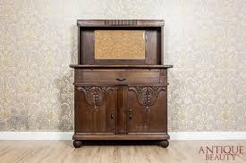 Italian art nouveau sideboard, in original solid oak from 1910, original brass handles. Antique Beauty Art Nouveau Cupboard Sideboard