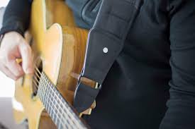 Sit down on a chair, put your two feet on the floor and keep your back straight. How To Hold The Guitar Hub Guitar