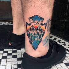 Arrow tattoos were originally based on native american tribal life hundreds of years ago. 80 Arrowhead Tattoo Designs For Men Ancient Weaponry Ink