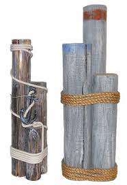 We offer a broad range of timber piling, dimensional, and timbers. Oceanic Arts Catalog Nautical Dockside Decor Dock Pilings Cargo Net Groups Barrels Crates Cork Bumpers Buoys