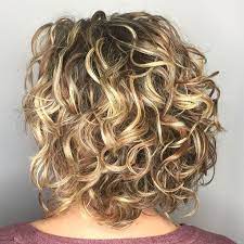 The honey bronde color is natural and pure and does a great job of covering up any stray gray strands that might be poking through. 55 Different Versions Of Curly Bob Hairstyle Bob Curly Hairstyle Versions Shorthairstyles Thin Curly Hair Medium Curly Hair Styles Curly Hair Styles