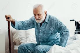 Model swedish grey hair silverfox mens style beard grooming silver male men's apperal men's clothes suit menwithstyle tshirt. Old Sick Man With Grey Beard And Hair Wearing Blue Pajamas And Sitting On Bed At Home Stock Photo Picture And Royalty Free Image Image 124525289