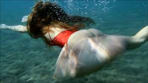 Check spelling or type a new query. Young Woman Swimming Underwater From Stock Footage Video 100 Royalty Free 3233554 Shutterstock