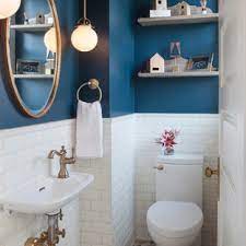 Custom tile backdrop and wooden counter in the powder room [design: 75 Beautiful Ceramic Tile Powder Room Pictures Ideas July 2021 Houzz