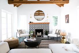 Spain has a warm climate, so homeowners often leave walls natural. A Spanish Style Home Is Reimagined Home Makeover