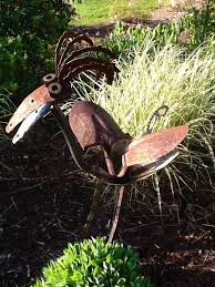 Creative Use Of Old Shovels Recycled Metal Art Metal Yard Art Scrap Metal Art