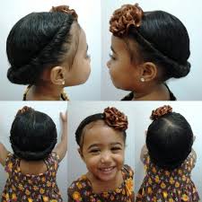 Straightened curls done into a top knot for a more elegant and sleek look. Pin On Cute Kids Hair Styles