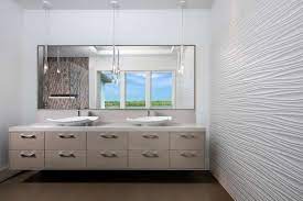 Maybe you would like to learn more about one of these? A Contemporary Design With Porcelanosa Oxo Line Blanco Wall Tile With A Floating Vanity A Kurtz Home Minimalist Baths Contemporary Minimalist New Homes