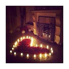 Rose Petals Candles In A Heart Shape In Front Of A Fireplace Romantic Room Romantic Surprise Romantic Night