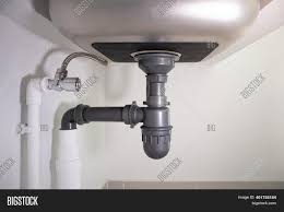 They can repair the surface damage and extend the life of the sink ten more years. Pipe Under Kitchen Image Photo Free Trial Bigstock
