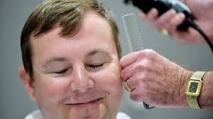 Employees raise money, manager gets head shaved for United Way