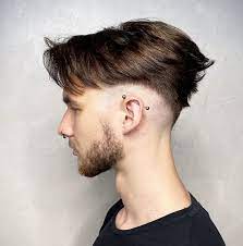 Similar to the 90s look that put hollywood's youngest stars on the map, a curtains hairstyle is also synonymous with hip surfer boys. 50 Perfect V Cut Hair Fashions The New Shape Of Style