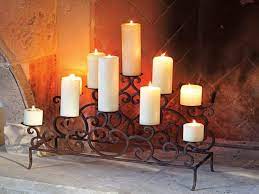 With flameless taper candles & holders. Candle Holders For Fireplace Mantel Fireplace Design Ideas Candles In Fireplace Fireplace Candle Holder Fireplace Candelabra