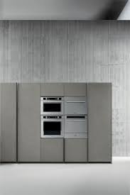 The protagonists are definitely the wood with its materiality and the brand new metal finishing that, aesthetically, is very close to the metal. Linear Fitted Kitchen From Zampieri Is Style Personified