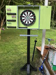 They will be drilled into the 3/4″ side of the 1×2. Outdoor Dart Board Cabinet Mounted With French Cleat Backyard Games Diy Outdoor Dart Board Dartboard Stand Diy