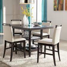 Okoume veneer, asian hardwoods, glass. Trishelle 5 Piece Counter Height Dining Set Nebraska Furniture Mart Contemporary Dining Room Furniture Dining Room Remodel Dining Room Sets
