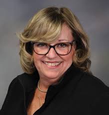 The sirens sounded close. Too close.