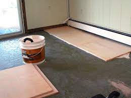 Prime the backing board surface using a quality primer. How To Install Plywood Floor Tiles Hgtv