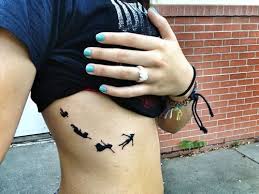 Pin By Corianne Langford On Tats Peter Pan Tattoo Tattoos Cute Tattoos
