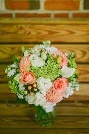 Coral and green wedding bouquets. Pin By Kelly Brown On Wedding Wedding Flowers Coral Wedding Colors Coral Flowers