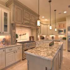 Gray Washed Kitchen Love The Detailed Cabinet Above Stove And Countertops Traditional Kitchen Design Kitchen Design Solid Wood Kitchen Cabinets