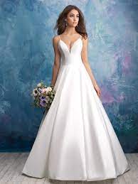 Most of ball gown wedding dresses are tulle, organza, satin and taffeta. A Crisp Sheen Complements The Beautifully Clean Lines Of This Strappy Ballgown Just Arri Allure Bridal Wedding Dress Allure Wedding Dresses Ball Gowns Wedding