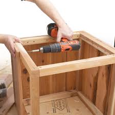 It has a nice rustic look plus a lower shelf that you can use for storage or decorations. How To Build A Planter That Has Character And Style