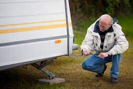 Put leveling blocks near the tires of the travel trailer How To Level Your Travel Trailer