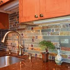 Beautiful use of orange tile as a counter top backsplash in the kitchen. Subway Slate Glass Mosaic Kitchen Backsplash Tile