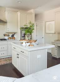 If you're in the market for new kitchen cabinets, you've likely noticed how today's cabinets are smoother and sleeker than years. Update And Make A Traditional Cream Kitchen More Modern On A Budget