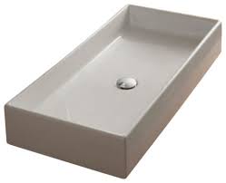 rectangular white ceramic vessel sink