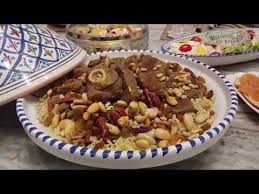 روز ازعر بالفاكية بالعلوش Riz Aux Fruits Secs Et Agneau Youtube Food Health Food Raisin