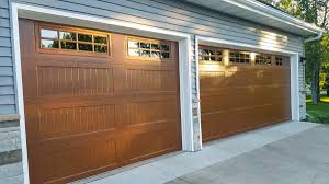 Simple forms invite the beauty of a natural handcrafted wood garage door to stand out, laying the foundation for a warm and welcoming arkansas home. Midland Garage Door On Twitter Give Your Home Fresh Dimension With Our Classic Yet Contemporary Long Panel Carriage Garage Doors In Light Oak Get The Look Of Natural Wood With The Strength