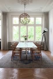 Modern scandinavian design is all about keeping thing sparse and clean, thus, the barboy table trolley makes for the perfect accessory in the dining the simple design of the virka high sideboard from would brings an elegant and minimal scandinavian presence to modern dining rooms. Classic French Meets Contemporary Scandinavian Style In Amsterdam Home Dining Room Inspiration Dining Room Design