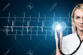 attractive concentrated female doctor checking heart beat healthy