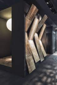 A Project Combining Sleek Decoration With A Bit Of Mistery In A Place Devoted To Business Transactions Showroom Interior Design Showroom Design Tile Showroom