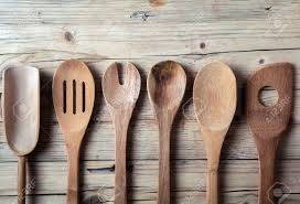 Browse our range of kitchen utensils and tools here. Row Of Assorted Old Wooden Kitchen Utensils Lying On A Grungy Cracked Wooden Surface In A Country Kitchen Stock Photo Picture And Royalty Free Image Image 24936950