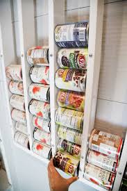 When food come in cans, a can dispenser makes it possible to rotate your cans of food, always using the oldest first. Wall Mounted Can Organizer Ana White