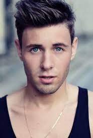 Types Of Haircuts For Men Young Blue Eyed Man Dressed In A Black Tank Top With Glossy Dark Frisur Langes Gesicht Haarschnitt Manner Frisuren Ovales Gesicht
