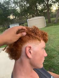 Teenager offering hair cutting services