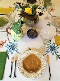 A classic fall table setting with candles, faux pumpkins, pinecones, berries and other fall stuff a fall tablescape with a stump centerpiece with blooms, cotton and apples, green glasses and plates, gold chargers and cinnamon sticks A Fresh Look At Classic Decor And Table Settings Autumn Lunch This Is A Simple Table Setting For
