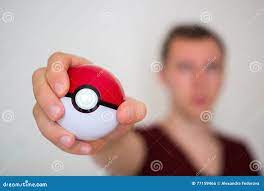 Young Man Holding the Pokeball Editorial Photo - Image of outdoor, phone:  77159466