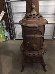 Log wood cast iron stove, black. Vintage Round Wood Burning Castiron Stove Repair Or Parts Wood Stove Stove Stove Repair