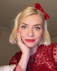 Science behind Holly Willoughby's incredible success from her love of red  outfits to 'Bambi eyes'... and famous boobs