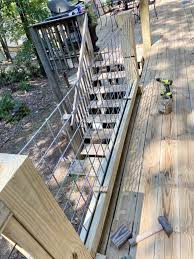 Learn how to make these hog wire panels for your next railing. Diy Hog Wire Deck Railing