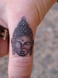 Pin By Nicolina Dreamy Sturesson On Bodymodifications Tattoos Finger Tattoos Buddhist Tattoo