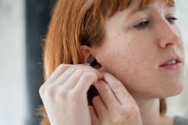 Press the center button twice. Stop Wearing Your Earphones The Wrong Way Wired